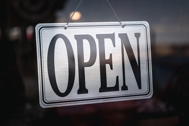 OPEN sign in a small business storefront window