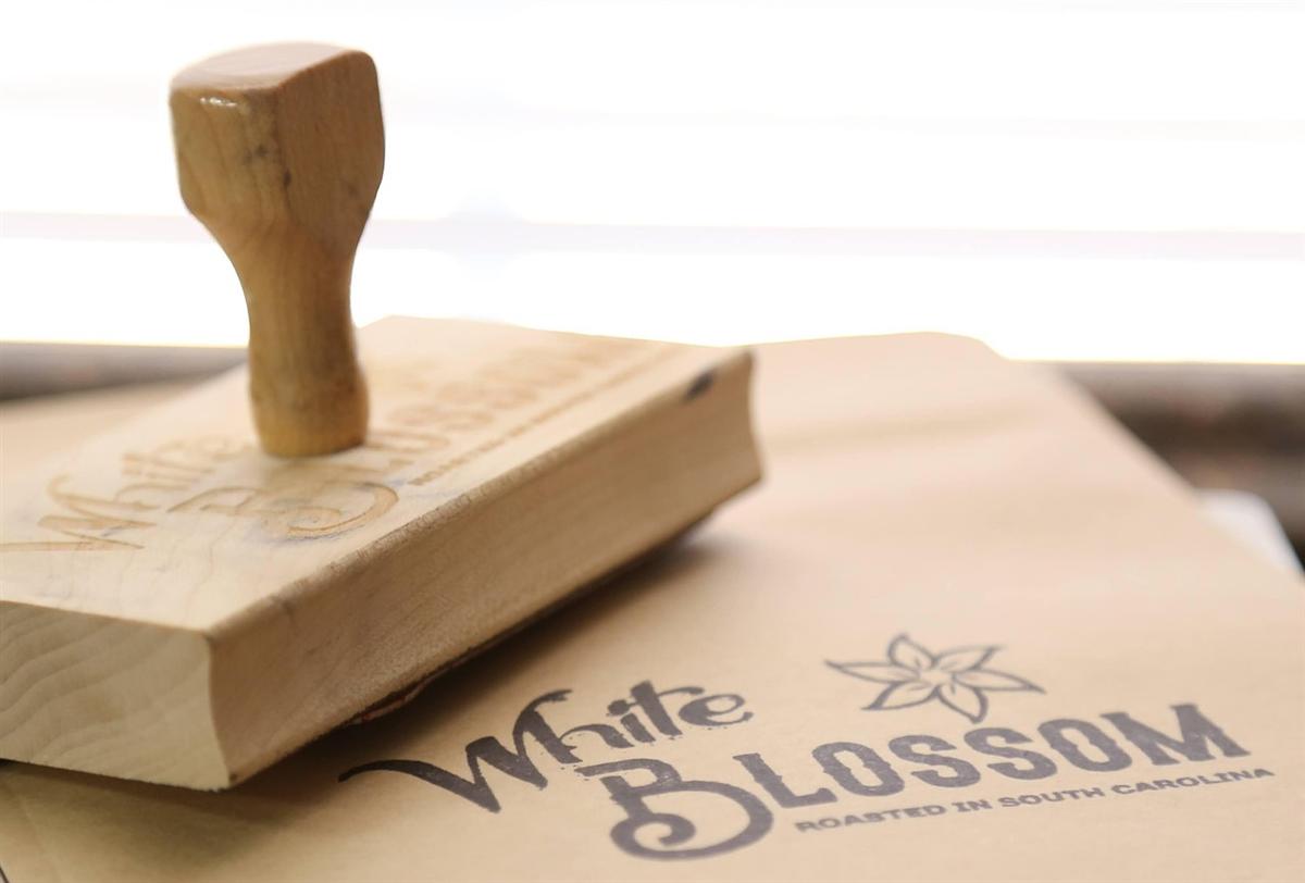 Artisan wooden coffee stamp -- the mark of a real brand story