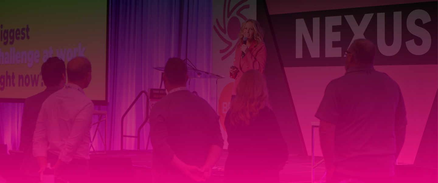 Shawna Suckow, CSP — consumer behavior expert, marketing author, small business keynote speaker — on stage Nexus conference