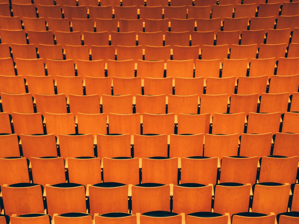 How to Use Video Marketing to Grow Your Business - empty auditorium