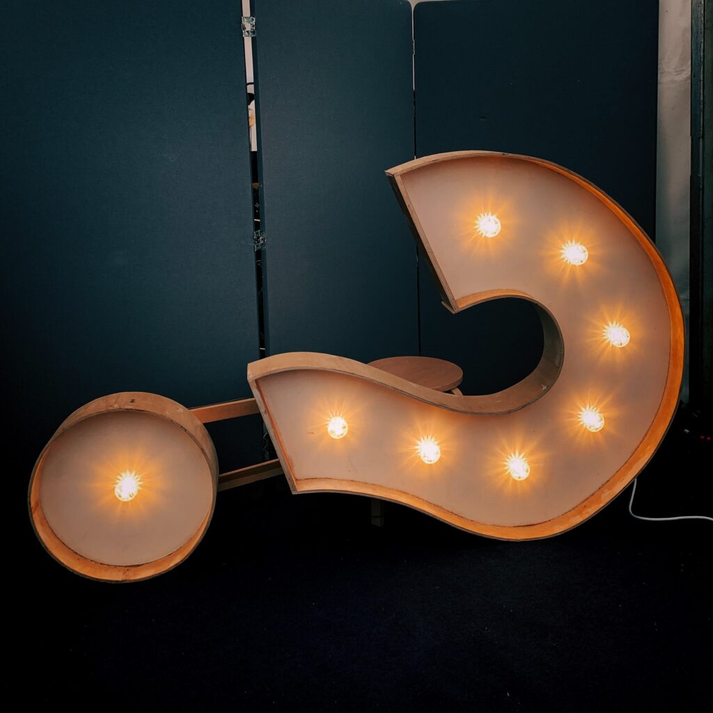 How to reach prospects and customers? giant question mark with lights